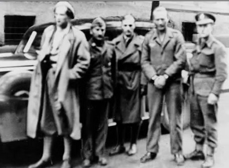 Siegfried Fehmer captured and escorted by TJ